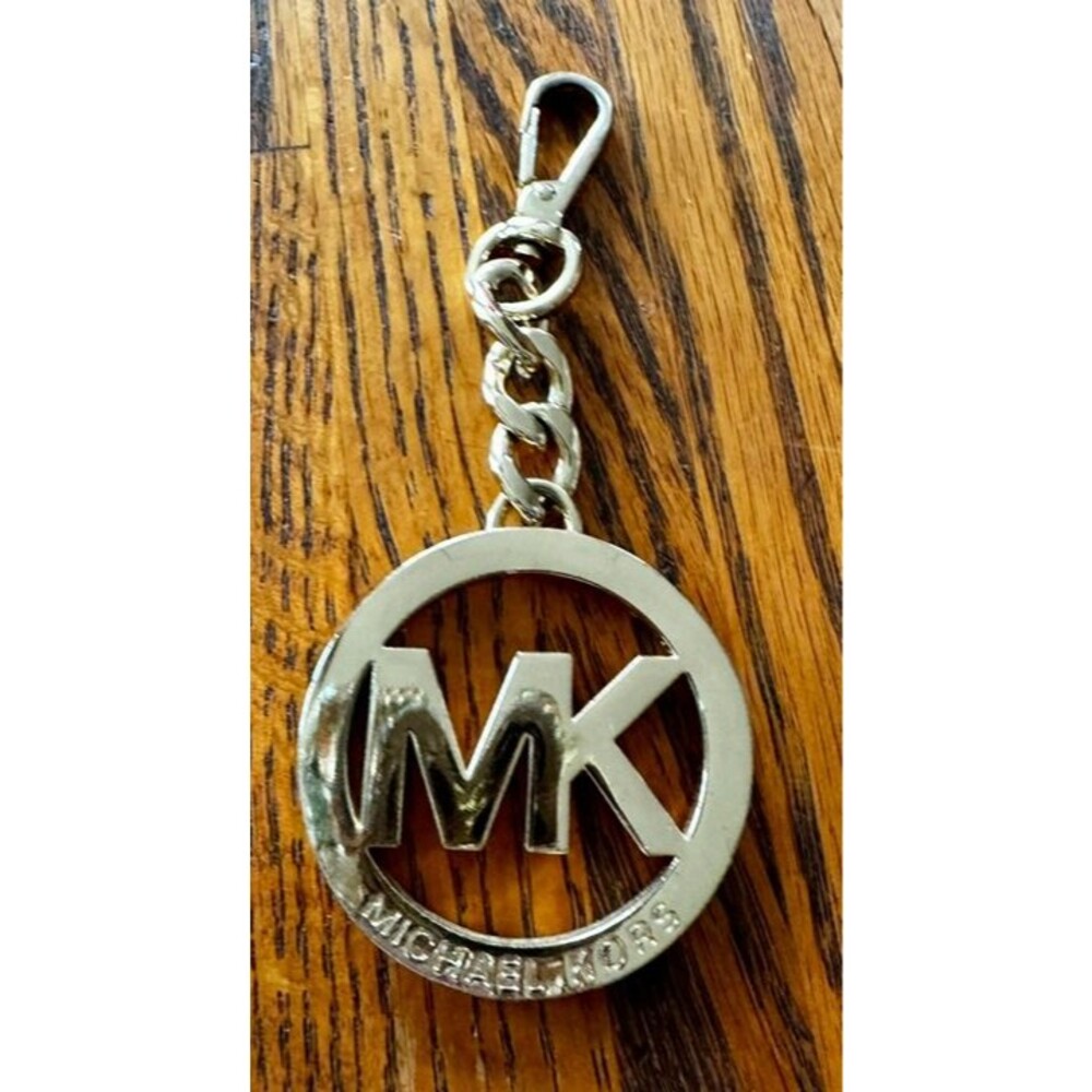 Michael Kors  Gold Tone Round Clip On Purse Bag Charm Fob Chain